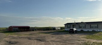 Three Bedroom, Two Bathroom Home with Barn & Corrals