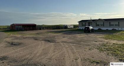 Three Bedroom, Two Bathroom Home with Barn & Corrals