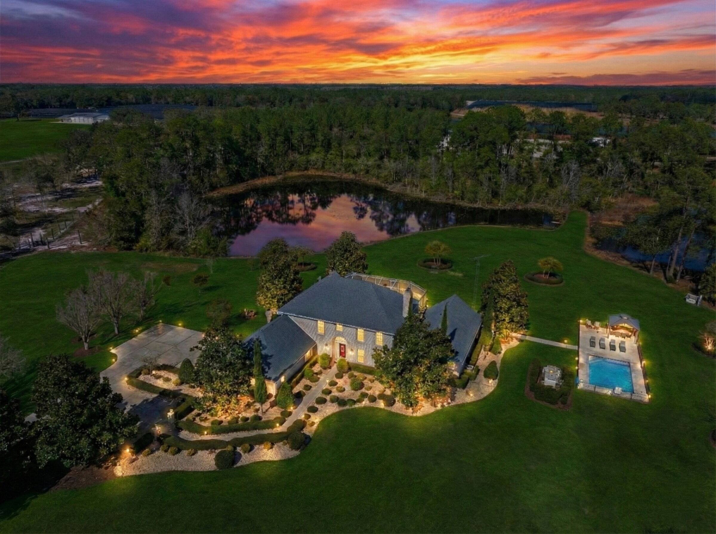 Private 10-acre French estate with twin lakes at sunset