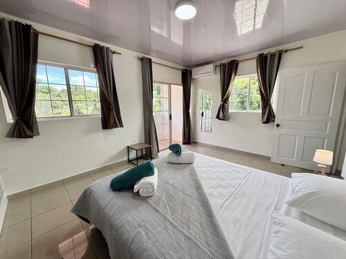 Appartement Manohiti, le calme au centre de Pirae - 1 ch, clim, WiFi