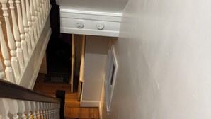 A wooden staircase with white balusters leading to a landing. - 2bedroom, No living room, EinsteinHospital & Salus University (Philadelphia)