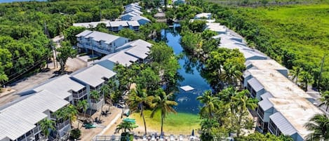 Aerial: 4.5 acre salt water lagoon with tropical fish | Kawama Yacht Club & Resort