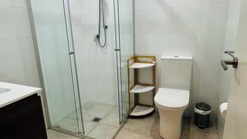 Hair dryer, towels, soap, toilet paper