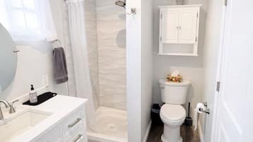 Hair dryer, towels, soap, toilet paper