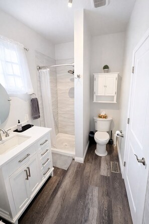 Hair dryer, towels, soap, toilet paper