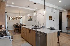 Fridge, microwave, oven, stovetop - Downtown WP Loft 215 I Private Hot Tub I Great Views I Discounted Attractions (Winter Park)