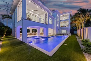 A heated pool - White Sands:Ultra Luxury Estate Beach Block, Gulf & Bay Views by  Anna Maria Life Vacation Rentals (Anna Maria)