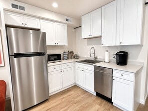 Fridge, microwave, dishwasher, coffee/tea maker