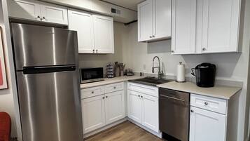 Fridge, microwave, dishwasher, coffee/tea maker