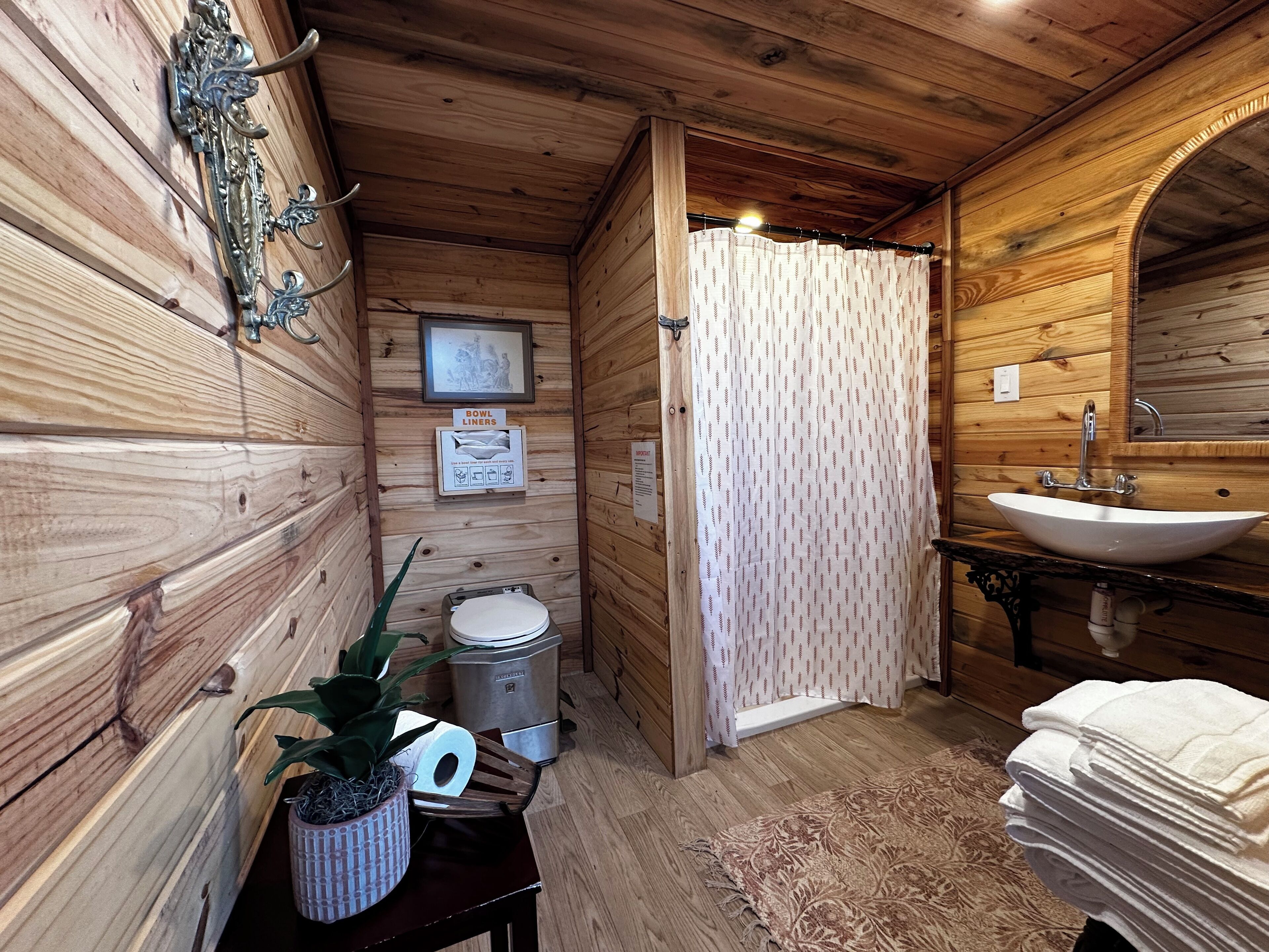 Shower, towels, soap, toilet paper