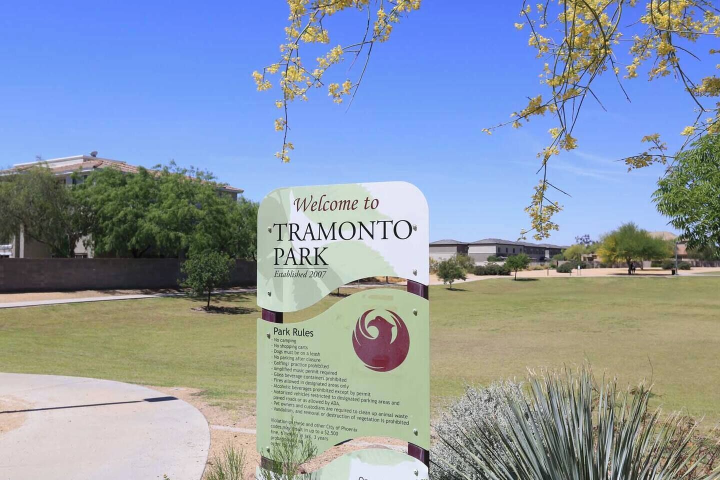 A welcome sign to Tramonto Park with park rules listed.
