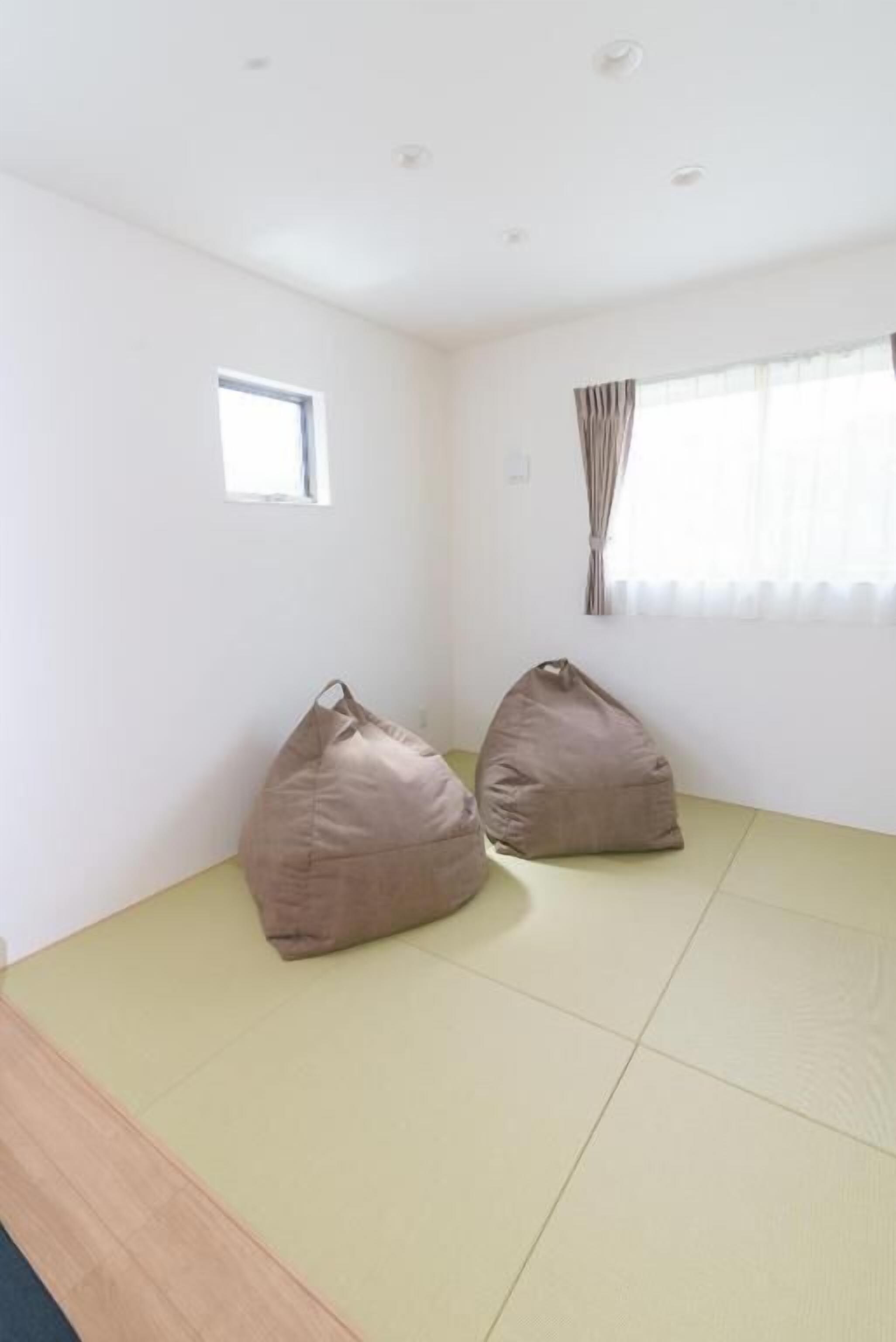 Deluxe-Villa, Balkon, Gartenblick | Innenbereich