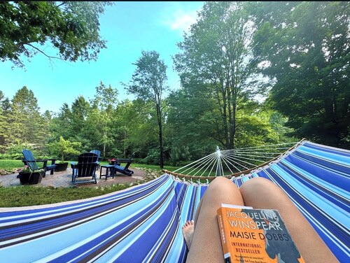 Northern Michigan Woodland Retreat - Cozy Comfort Near City Conveniences