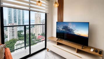 Design Apartment, Balcony, Partial Ocean View | Living area