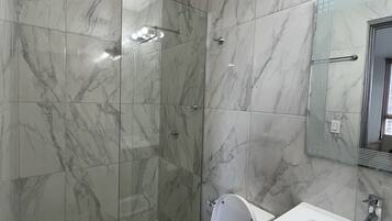 Executive Apartment, Balcony, City View | Bathroom | Shower, hair dryer, slippers, towels