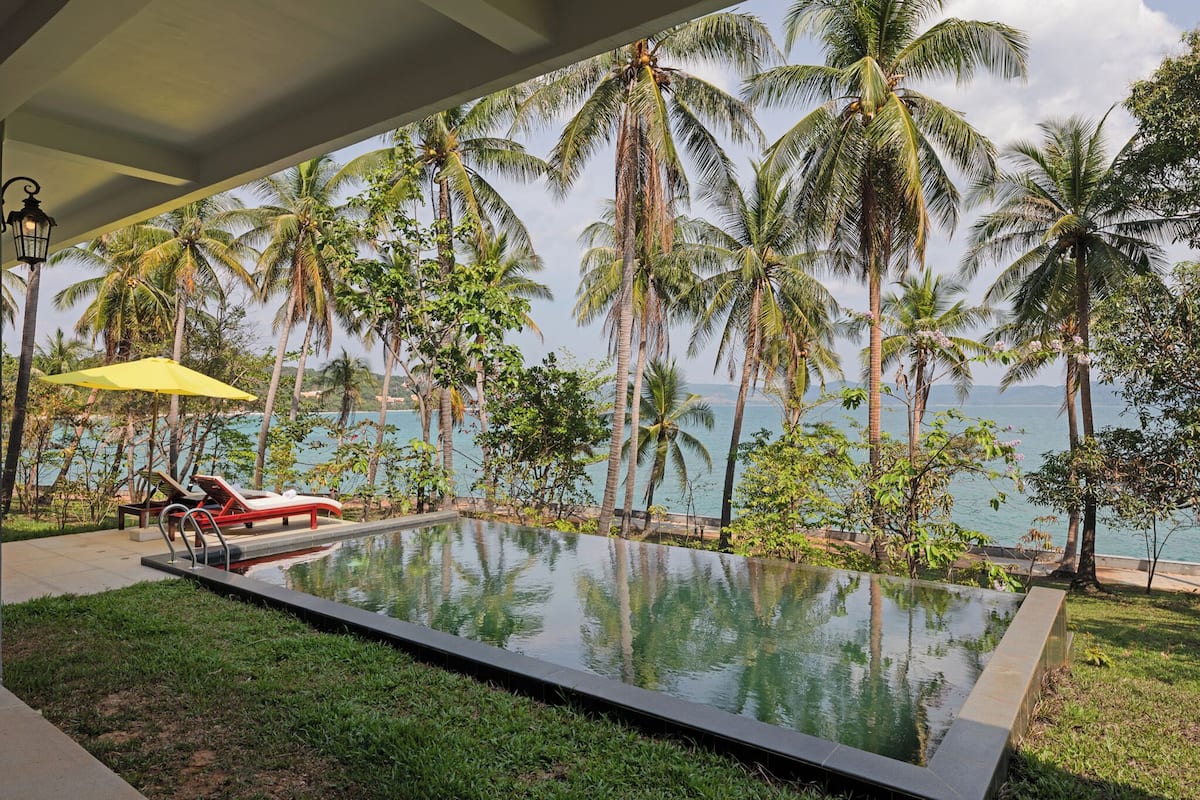 Premier Villa, Balcony, Ocean View | In-room safe, desk, laptop workspace, blackout drapes