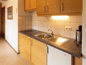 Fridge, cookware/dishes/utensils - Katschberg 23 by Interhome (Sankt Michael im Lungau)