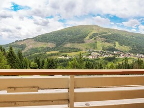 A mountain landscape with a town in the valley.