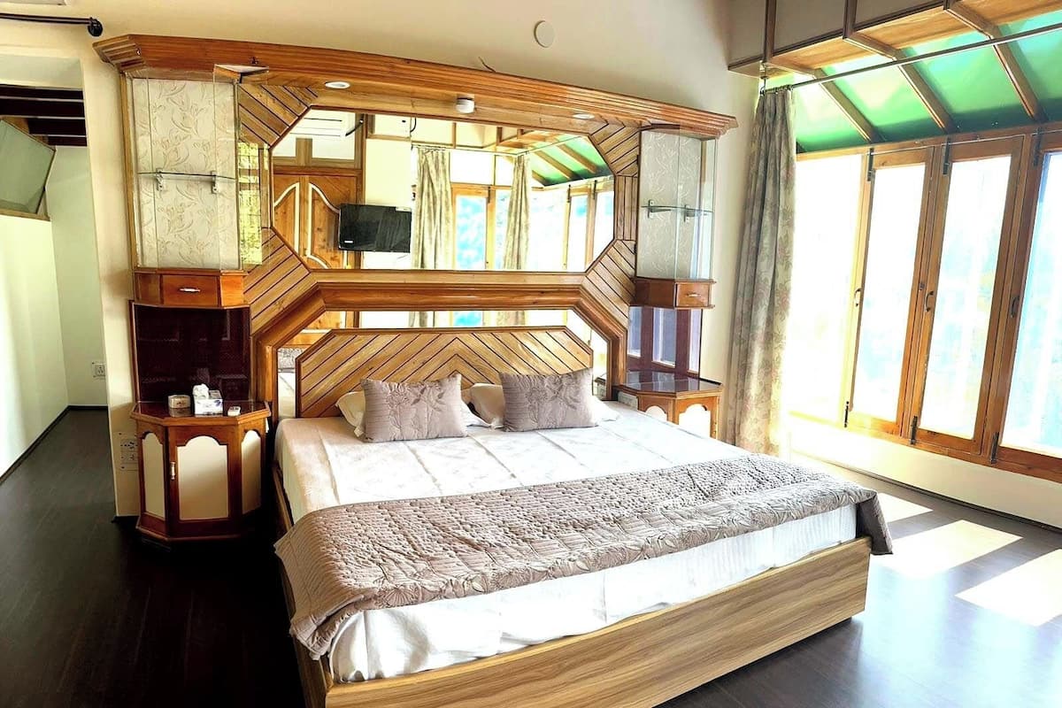 Deluxe Room, Air conditioning, Garden View | Desk, laptop workspace, rollaway beds, free WiFi