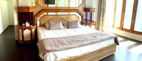 ห้องดีลักซ์, เครื่องปรับอากาศ, วิวสวน | โต๊ะทำงาน, พื้นที่ทำงานแบบใช้แล็ปท็อป, เตียงเสริม/เปล, Wi-Fi ฟรี