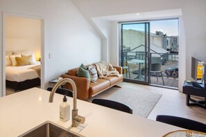 TV - Modern Central City Apartment | King Bed (Christchurch)