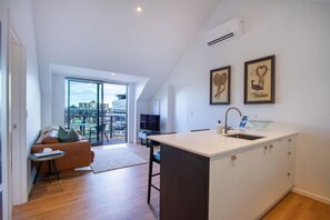 TV - Modern Central City Apartment | King Bed (Christchurch)