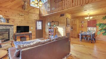 TV, fireplace, books