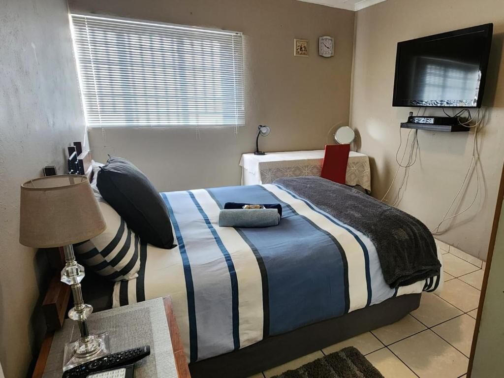 Apartamento, 2 quartos, cozinha, vista para o jardim | Individualmente decorados, individualmente mobiliados, Wi-Fi de cortesia