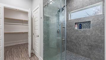 Shower, towels, soap, toilet paper