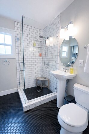 Shower, hair dryer, towels, soap