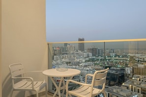 Outdoor dining - FIRST CLASS |1BR| Miracle Garden View | Skyz Arjan (Arjan)