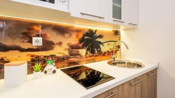 Apartment (One Bedroom Apartment with Balcony) | Private kitchen | Fridge