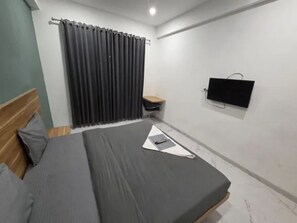 Habitación Deluxe | Sábanas de algodón egipcio, ropa de cama de alta calidad, wifi gratis