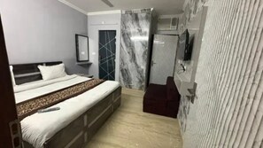 Deluxe Room | Cadar kapas Mesir, peralatan tempat tidur premium, Wi-fi percuma 