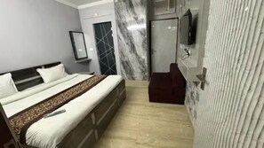 Deluxe Room | Cadar kapas Mesir, peralatan tempat tidur premium, Wi-fi percuma 