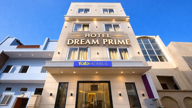 A hotel named 'Dream Prime' with a modern facade, large windows, and a prominent sign for 'fabHOTELS'. - FabHotel Dream Prime (Jaipur)
