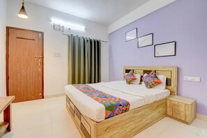 Habitación Deluxe | Sábanas de algodón egipcio, ropa de cama de alta calidad, wifi gratis