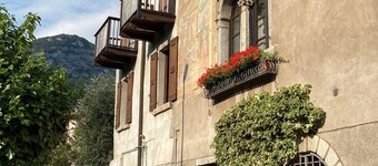 Charming apartment with studio in the historic old customs house in Nago-Torbole.