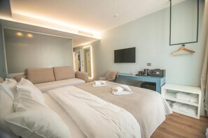 Deluxe Double Room, Balcony, Partial Sea View | In-room safe, desk, laptop workspace, soundproofing