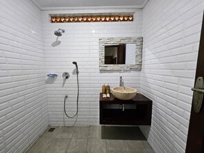 Shower, bidet, towels, soap