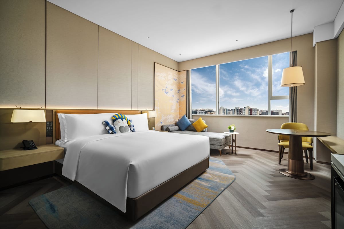 Premium bedding, down duvets, Select Comfort beds, minibar