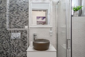 Douche, serviettes fournies
