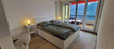 Deluxe Condo, Balcony | Iron/ironing board, free WiFi