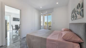 Apartment, Balcony | In-room safe, iron/ironing board