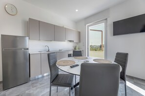 Private kitchen - Sole Apartment (Torre San Giovanni)