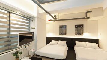 Habitación cuádruple Deluxe | Insonorización y wifi gratis