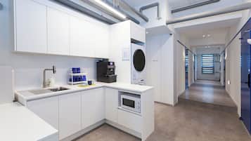 Mini-fridge, microwave, stovetop, cookware/dishes/utensils