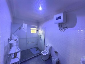 Luxury Single Room, Balcony, City View | Bathroom | Free toiletries, slippers, towels, soap - Deluxe Indulgence Hotel and Suites (Abuja)