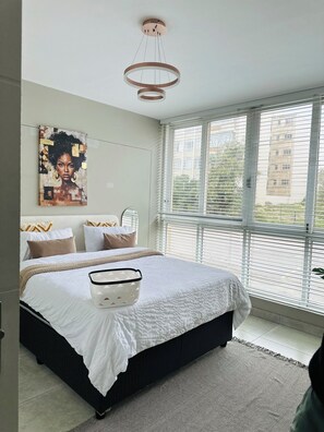 2 dormitorios, tabla de planchar con plancha, wifi gratis y ropa de cama