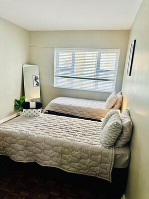 2 dormitorios, tabla de planchar con plancha, wifi gratis y ropa de cama